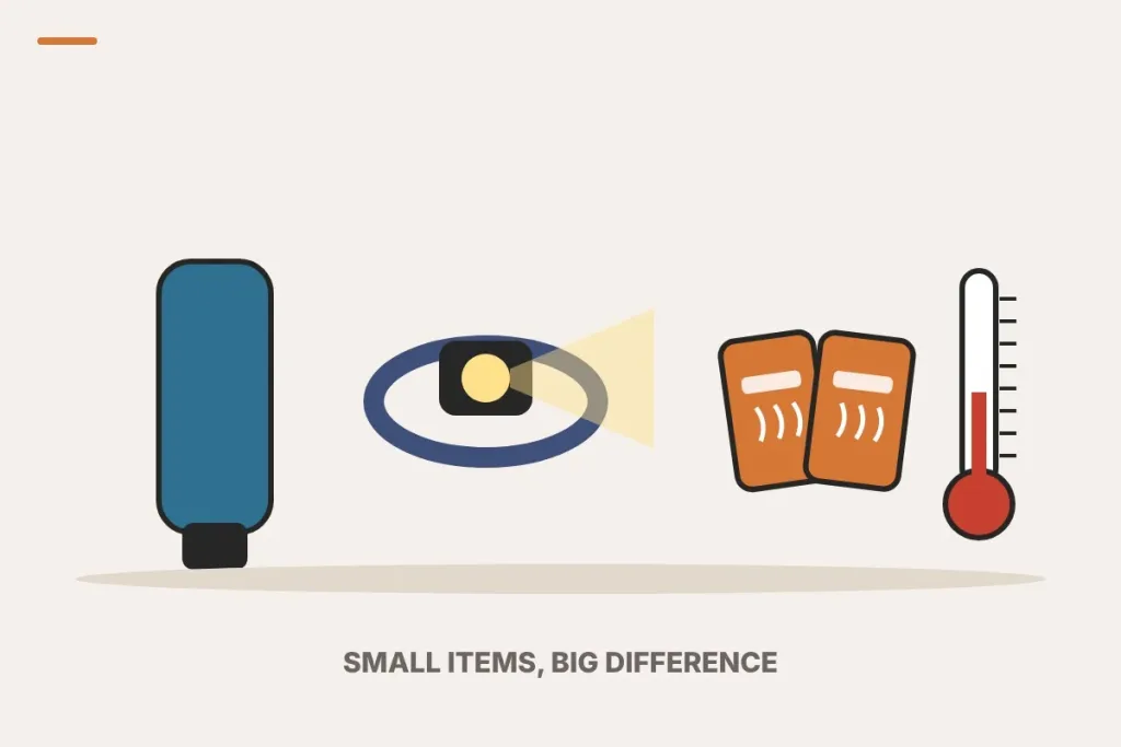 Illustration of an insulated bottle stored upside down, a headlamp, a pair of hand warmers and a thermometer